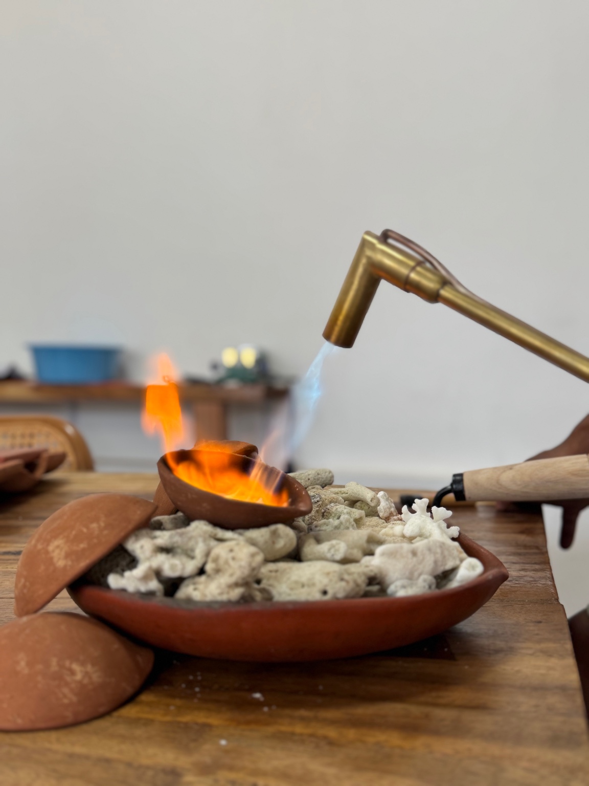 Molten silver flame over coral at Gilinked Atelier